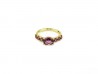 Yellow gold ring with central Rhodolite and 6 side Rodolitas