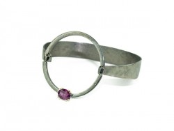 Silver and yellow gold bracelet with Rhodolite.