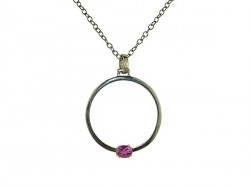 Silver pendant and yellow gold clasps holding Rodolite.