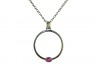 Silver pendant and yellow gold clasps holding Rodolite.