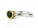 Silver and gold ring with green tourmaline.