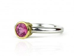 Silver ring and yellow gold with pink tourmaline.