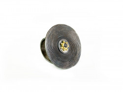 Oxidized silver ring with center in 750mm yellow gold and brilliant cut black diamond.