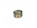 Oxidized silver ring, striped texture, with center in pink gold of 750mm and natural Ruby.