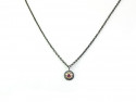 Matte rusty silver pendant with 750mm rose gold center and natural Ruby with dark silver chain.
