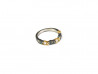 Ring in yellow gold and oxidized silver, with 3 white brilliant.