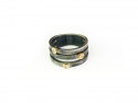 Ring in oxidized silver and 3 mouths in 750mm yellow gold and with 3 white brilliants.