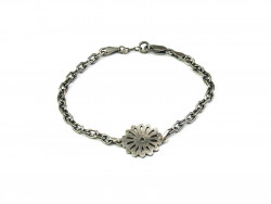 Rusted silver bracelet with medium center flower and flexible ring chain.