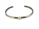 Rhodium-plated silver bracelet, open, with yellow gold center and 7 white diamonds.