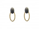 Satin silver earrings and ring in nuanced yellow gold.