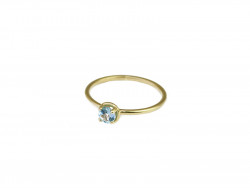 Yellow gold ring with 4mm diameter natural blue topaz.