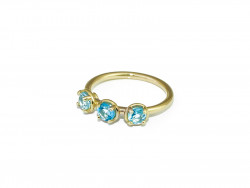 750mm gold ring and three round natural blue topaz. Staples.