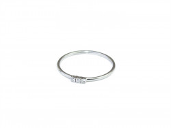 Anillo oro blanco de 750mm con 3 Brillantes naturales.