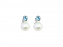 Earrings with blue topaz and a pair of 8.50mm freshwater pearls.
