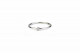 White gold ring and 1 brilliant.