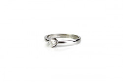 White gold solitaire with central brilliant.