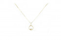 Round yellow gold pendant with a brilliant.