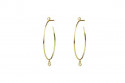 Yellow gold earrings with an open oval creole shape and 4 brillliants