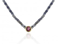 Cianita stone necklace with golden mouth and pink tourmaline stone.