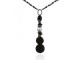 Amethyst necklace with pendant stones, pieces of silver, pearls, seed ball and resin disks.