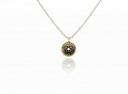 Pendant silver and yellow gold with black diamonds.