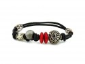 Leather and rubber bracelet with pieces of silver and resin disks.