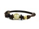 Leather and rubber bracelet with Australian pearl Golden and shiny gold motif.