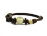 Leather and rubber bracelet with Australian pearl Golden and shiny gold motif.