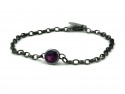 Silver bracelet with garnet and insert.