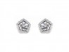 Gold earrings, pearl and bright flower.