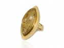 Gold ring with rutile quartz.