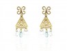 Gold earrings with blue topaz and rock crystal.