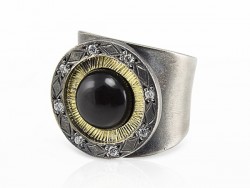 Silver ring and yellow gold with white diamonds and onyx.