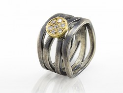 Silver ring and yellow gold with diamonds banks.