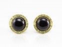 Silver earrings, gold and onyx.