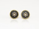 Silver earrings and yellow gold with white diamond border.