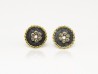 Pendientes de plata y oro amarillo con orla de diamantes blancos.