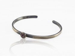 Silver bracelet and rubies.